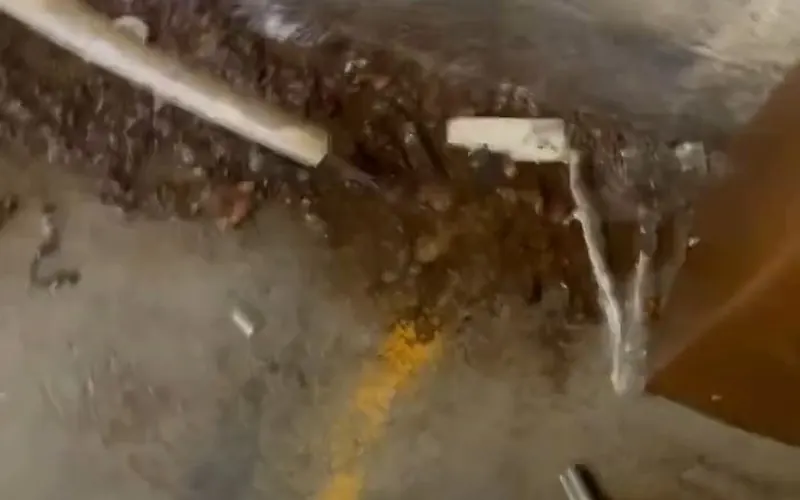 Close view of exposed pipe section being repaired after a water leak for Burst Pipe Repair service in Mechanicsburg