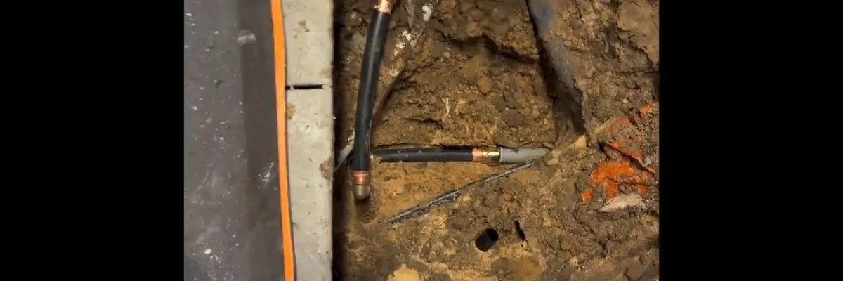 Wide view of exposed pipe section being repaired after a water leak for 24 7 Emergency Plumbing service in Mechanicsburg