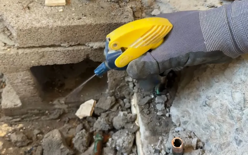 Close view of exposed pipe section being repaired after a water leak for Frozen Pipe Repair service in Mechanicsburg
