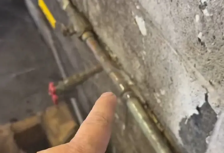 Exposed pipe section being repaired after a water leak for Burst Pipe Repair service in Mechanicsburg