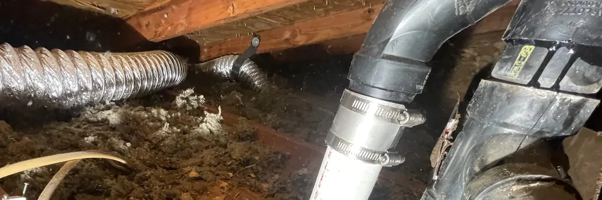 Wide view of kitchen sink drain and supply plumbing being installed for Kitchen Plumbing Remodel service in Mechanicsburg