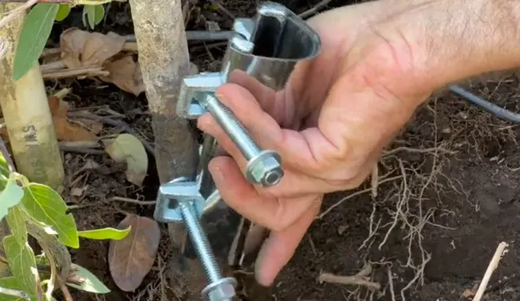 Outdoor hose bib connection being repaired near the wall for Hose Bib Winterization: West Shore Fall Checklist