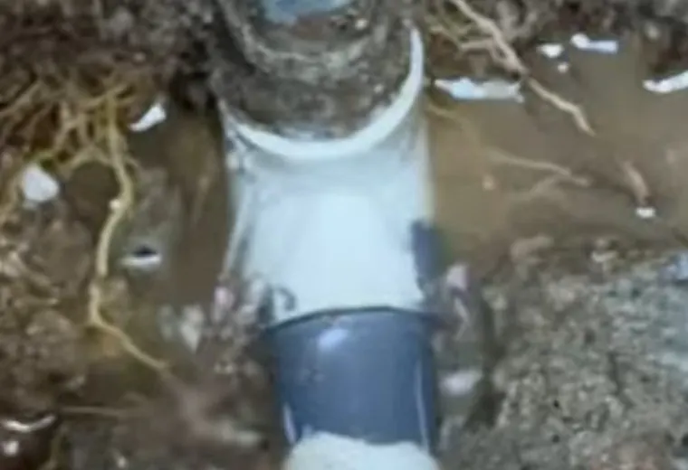 Concrete slab leak access area with plumbing exposed for Slab Leak Detection service in Mechanicsburg