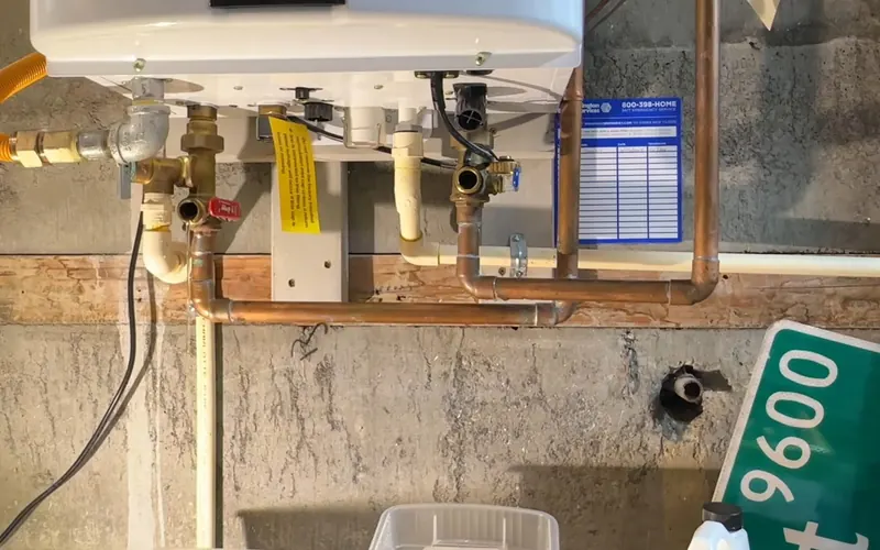 Close view of tankless water heater piping and service valves for Water Heater Repair Replacement service in Mechanicsburg