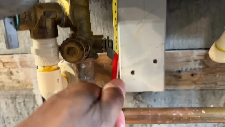 Close view of tankless water heater piping and service valves for Tankless Water Heater Retrofit: Cumberland Valley